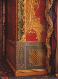 an elaborately decorated cabinet in a room