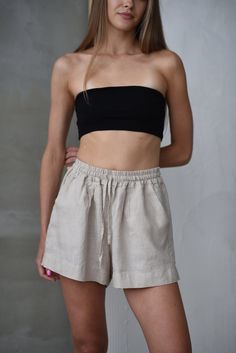 Indulge in effortless comfort and style this summer with our beautifully crafted linen shorts. Made from 100% softened European linen, these breathable shorts offer a luxurious feeling against your skin. We prioritize quality and sustainability.  Our linen is OEKO-TEX Standard 100 certified, meaning it's free from harmful chemicals. These shorts are machine washable for easy care. Simply wash with similar colors on a cold, gentle cycle, avoid bleach, and line dry or tumble dry low. The model in our photos is wearing a size Small and is 1.73 meters tall. For more information on sizing and care,  please don't hesitate to contact us! Tailoring Ideas, Linen Shorts Women, Shorts Linen, Linen Summer, Women Shorts, Shorts For Women, Linen Shorts, Harmful Chemicals, Body Size