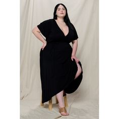 The Georgia Plus Size Wrap Dress is a WEST K staple - it has a v-neckline, flutter sleeves, a faux wrap tie-waist detail and a hi-low hem. The easy fit silhouette and comfort stretch will make this dress a favorite piece you'll want in every print and color. Made in USA. Machine washable. Flowy Faux Wrap V-neck Dress, Flowy V-neck Faux Wrap Dress, Flowy Faux Wrap V-neck Maxi Dress, Black Faux Wrap Dress For Spring, Black Wrap Dress With Surplice Neckline And Faux Wrap, Flowy Faux Wrap Maxi Dress, Solid Color V-neck Faux Wrap Dress, Flowy Faux Wrap Dress, Summer V-neck Faux Wrap Maxi Dress