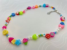 ✨Kiddie Necklace✨ The Kiddie Necklace IS the perfect Y2k moment! Made with a variety of clay and plastic beads strung in a fun pattern, this necklace measures 17 1/2 inches at its regular length, but can be adjusted up to 18 7/8 inches. !! Please note !! each of the necklaces I have in stock are not exactly the same since some of the beads I only have one or two of. So the necklace you receive may not look exactly like the listing picture, but each are unique and cute! Childrens Necklace, Bead Stringing, Plastic Beads, Cool Patterns, Jewelry Crafts, Necklace Etsy, Necklace Lengths, Beaded Necklace, Handmade Items