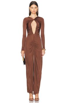 Find ATLEIN Cut Out Ruched Gown In Brown on Editorialist. Atlein Cut Out Ruched Gown in Brown 100% viscose. Made in France. Dry clean. Unlined. Hidden back zipper closure. Front ruching detail. ATLF-WD10. RA07. About the designer: Ruched Gown, Bronze Dress, Plunging Neck Dress, Brown Outfit, Color Crush, Draped Dress, Cut Out Design, Summer Cotton, Skirt Top