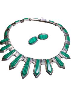 Modernist 950 Mex Silver Malachite Necklace & Earring set. Very unique setting purchased in the 70's abroad.  More pictures to come. We are accepting offers on this item. Total weight: 172 g Estimated retail value: $2000- $4000 Mid-century Green Collectible Jewelry, Mid-century Cabochon Jewelry For Formal Occasions, Mid-century Green Formal Jewelry, Retro Formal Jewelry With Matching Earrings, Mid-century Polished Formal Jewelry, Retro Formal Jewelry With Polished Finish, Retro Polished Jewelry For Formal Occasions, Retro Polished Formal Jewelry, Retro Polished Finish Formal Jewelry