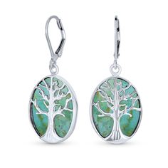 Help to celebrate the beauty of nature with our Celtic tree of life lever back earrings. Each tree of life earring features a 925 sterling silver tree of life against an oval feminine background. Nature lovers rejoice and enjoy wearing your newest pair of sterling silver tree of life earrings. Sterling Silver Tree Of Life Jewelry, Nature-inspired Oval Sterling Silver Jewelry, Carat Size Chart, Family Tree Of Life, Tree Of Life Earrings, Celtic Tree Of Life, Western Earrings, Turquoise Earrings Dangle, Celtic Tree