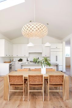 Styled Woven Leather Strap Dining Chair in a white kitchen. - Saffron and Poe Woven Leather Dining Chair, Kitchen Neutral, Frame Kitchen, Ceiling Kitchen, Airbnb Ideas, Interior Design Contemporary, Tropical Interior, Kitchen Contemporary, Mexico Design