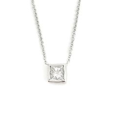 GIA Princess Bezel Solitaire Diamond Pendant Necklace 14K White Gold .50 CT Make a statement with this beautiful necklace. Please let us know if you have any questions :) Diamonds: 1 princess cut, .50 ct, G, VVS2 Certificate: GIA Metal: 14K white gold Weight: 1.95 grams Stamped: 14KT Length: 16 inches Pendant: 5.6 mm x 5.7 mm Clasp: lobster Stock: N857 Formal Solitaire Pendant Necklace With Bezel Setting, Classic Square Pendant Jewelry With Single Diamond, Fine Jewelry Solitaire Necklace With Bezel Setting, Platinum Bezel Set Diamond Necklace, Platinum Diamond Necklace With Bezel Setting, Formal Single Diamond Square Pendant Jewelry, Formal Jewelry With Single Diamond Square Pendant, Formal Square Pendant Jewelry With Single Diamond, Luxury Solitaire Necklace In Diamond White With Bezel Setting