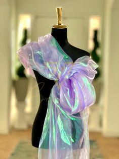 Bring vibrant energy and a touch of glamour to your next creative project with this eye-catching iridescent Organza fabric. Make a striking impression by creating dazzling garments, statement decorations, or unique craft items. The iridescent quality adds a mesmerizing dimension, catching and reflecting light for a truly captivating effect. Whether you're a fashion designer, DIY enthusiast, or event decorator, this neon pink iridescent organza fabric is a must-have for adding a pop of color and shimmer to your creations. Width: 59 inches Iridescent Ball Gown, Iridescent Organza, Fairytale Ball, Ball Inspiration, Fantasy Inspo, Coral Colour, Pink Iridescent, Reflecting Light, A Fashion Designer