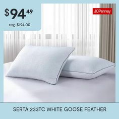 two pillows on top of a bed with the price $ 94 99