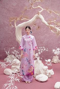 At EmTam Boutique, you will find the most stylish outfits in a wide size range and high quality at reasonable prices   - This set includes 1 ao dai top & pants, perfect for any special occasions like lunar New year, mid-autumn festival, wedding, temple, church or photoshoot...  - There might be up to 10% color variance due to lightning and viewing devices   - Sizes may run small so please go up 1 size or contact us if there's   any question. Please refer to the sizing charts for sizing.  - We support exchange for sizing inaccuracy. Please contact us within 3 business days of receiving the item for exchange authorization and instruction. Please note that customers are responsible for return shipping cost  - All items must be unworn, unused, tag attached and unaltered in any way to be eligib Spring Wedding Sets With Stand Collar, Traditional Purple Sets For Spring, Spring Purple Ao Dai, Traditional Full-length Sets For Spring, Traditional Full Length Sets For Spring, Traditional Full-length Spring Sets, Purple Wedding Sets For Spring, Spring Wedding Purple Sets, Purple Long Sleeve Ao Dai For Spring