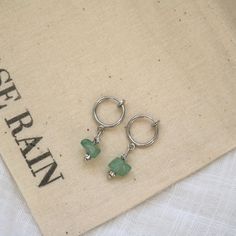 Handmade Platinum Plated Clip on Huggie Earrings in Green Aventurine - For non pierced ears (These earrings are made with natural stones, therefore colour & size may vary) LINK TO MATCHING NECKLACE: https://www.etsy.com/uk/listing/1299739417/silver-necklace-with-green-aventurine?click_key=fba9690d58b966803b8a0d10915569f42fe1a706%3A1299739417&click_sum=3167db2f&ref=shop_home_active_1&clickFromShopCard=1&frs=1&sca=1 Natural Characteristics: Shades of pale green to dark forest green.  Birthstone: A Green Hoop Earrings With Natural Stones For Gift, Aventurine Natural Stone Dangle Jewelry, Everyday Green Earrings With Natural Stones, Adjustable Aventurine Dangle Jewelry, Silver Aventurine Dangle Jewelry, Handmade Jade Jewelry For Everyday, Handmade Everyday Jade Jewelry, Everyday Aventurine Jewelry With Natural Stones, Green Aventurine Stone