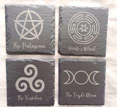 four stone coasters with different symbols on them, one for the triple moon and one for the pentagram