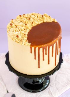 a cake with caramel drizzle and chocolate icing