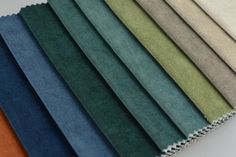 the colors of fabric are shown in different shades and sizes, including blue, green, brown