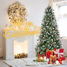 a christmas tree and presents in front of a fireplace with merry lettering on the wall