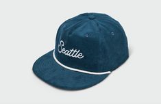 This Seattle Script 5 Panel Hat features quality cotton corduroy and rope detailing. The hip vintage flatbill design keeps the sun out of eyes, and the adjustable snapback closure ensures a personalized, comfortable fit. This hat is perfect for any fan of the Emerald City. 100% Cotton Corduroy Cap Matching Corduroy UnderVisor Vintage Lightly Structured Fit Snapback Closure Medium Crown One Size Fits Most Adults (6 7/8 to 7 3/4) Made in the USACut and Sewn in Kansas City, MO Retro Cotton Snapback Hat For Outdoor, Retro Adjustable Dad Hat With Flat Brim, Retro Adjustable Flat Brim Dad Hat, Trendy Cotton Trucker Hat With Flat Brim, Retro Adjustable Snapback Cap, Retro Adjustable Cotton Fitted Hat, Adjustable Retro Cotton Fitted Hat, Retro Adjustable Cotton Snapback Hat, Trendy Cotton Flat Cap Trucker Hat