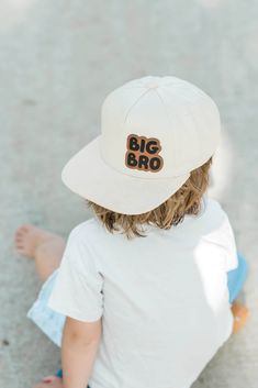 Celebrate sibling love with our "Big Bro" and "Little Bro" toddler and child snapback hats! These adorable matching hats are perfect for brothers who want to show off their special bond. Made from high-quality, durable materials, these snapbacks are comfortable and adjustable to fit growing heads. Whether for family outings, photo shoots, or just everyday wear, these hats add a fun and stylish touch to any outfit. Let your little ones sport their brotherly pride in the cutest way possible! Ideal White Snapback Baseball Cap For Birthday, White Snapback Hat For Birthday, Playful Adjustable Flat Brim Snapback Hat, White Snapback Cap For Birthday, Playful Adjustable Flat Brim Baseball Cap, Adjustable White Baseball Cap For Birthday, White Adjustable Snapback Hat For Birthday, White Adjustable Snapback Hat With Letter Patch, Cute Snapback Hat With Letter Print