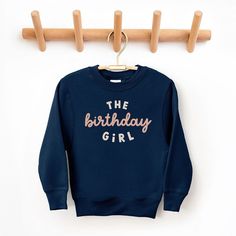 Looking for a cute sweatshirt for your kids? We have the perfect The Birthday Girl graphic sweatshirt addition to their closet! Also available in toddler sweatshirts. Cotton Sweatshirt For Birthday In Winter, Long Sleeve Fall Birthday Sweatshirt, Cotton Sweatshirt For Winter Birthday, Long Sleeve Winter Birthday Sweatshirt, Fall Birthday Crew Neck Tops, Fall Birthday Cotton Sweatshirt, Cute Crew Neck Birthday Sweater, Cute Crew Neck Sweater For Birthday, Cute Long Sleeve Sweatshirt For Birthday