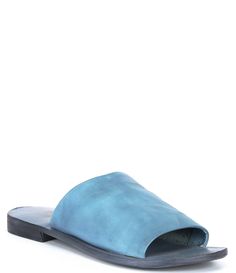 From Free People, the Vicente Leather Slide Sandals feature:Leather upperSlide-on stylingLeather liningSynthetic outsoleFlat heelImported. Leather Slides With Textured Sole And Open Heel, Blue Leather Slide Sandals, Leather Slides With Open Heel And Leather Footbed, Leather Slides With Open Heel And Leather Sole, Summer Leather Mules With Rubber Sole, Blue Leather Slides For Summer, Spring Closed Toe Slides With Leather Sole, Leather Slides With Textured Sole And Single Toe Strap, Leather Open Toe Mules With Textured Sole