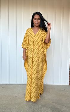 Top Rated Kaftans by Oprah Daily, Byrdi, Cosmopolitan, Elle, and more...  DETAIL  * Bust up to 68 in. * Waist up to 68 in. * Hips up to 68 in. * Arms open up to 22 in.  * Length  55 in. * V neck * Side slits * No pocket * Slipover style * All above measurement are flat FABRIC * 100 % Cotton Printed FIT * One size fit most up to size US 4XL  * Hangs loose and away from the body  * Length can be versatile as a knee length, mid calf length, ankle length  and floor length depending on your style  MO Flowy Yellow Maxi Dress For Beachwear, Yellow Flowy Beachwear Dress, Long Daywear Beach Dress, Yellow Printed Beach Cover-up Dress, Summer V-neck Kaftan For Daywear, Yellow V-neck Beachwear Maxi Dress, Yellow V-neck Maxi Dress Beachwear, Yellow Printed V-neck Kaftan, Yellow Bohemian Dress With Kimono Sleeves