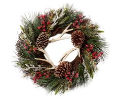 a christmas wreath with antlers and pine cones