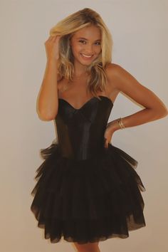 This dress features tulle material, a sleek black color, an A-line silhouette, a sweetheart neckline, a tiered ruffle skirt, an above knee length, and a zip-up back for a comfortable and stylish look. SKU: 3592 Tulle material Black color A-line silouette Sweetheart neck Tiered ruffle skirt Above knee length Zip-up back Highly suggest custom size for plus size. Ship in 7-10 business days. We offer free returns in 7 days. Please refer to our return policy page for more details. If you have any que Cocktail Dress Yellow, Tulle Ruffles, Tulle Material, Satin Homecoming Dress, Tulle Homecoming Dress, Short Homecoming Dresses, Homecoming Dresses Tight, Tiered Ruffle Skirt, Sequin Prom Dresses