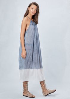 Say hello to Summer in our super billowy and lightweight dip-dye midi beach dress. Featuring a soft rope drawstring strap with lurex trim, halter neckline, and ruched back detail. Wear this oversize dress to your next pool party, or wear it around the house on a hot summer day! FINAL SALE Oversize fit Sleeveless Midi length Lurex trimmed rope halter Tie shoulder detail Tassel details Dip-dye Slightly sheer Model is 5'11, wearing a size S/M.Style: I-70999W Ombre Midi-length Summer Dress, Bohemian Drawstring Maxi Dress For Summer, Summer Beach Maxi Dress With Smocked Back, Spring Beach Midi Dress With Drawstring, Spring Vacation Midi Dress With Drawstring, Summer Maxi Length Dress With Drawstring, Summer Beach Maxi Dress With Drawstring, Breezy Beach Midi Dress With Spaghetti Straps, Breezy Midi-length Beach Dress