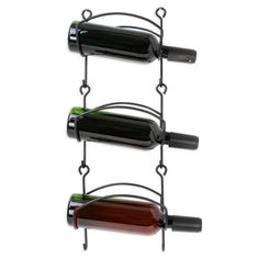 three wine bottles are hanging on the wall as if they were made out of metal