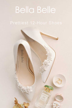 A fresh and feminine take on classic ivory closed-toe bridal shoes, Jasmine features luminous pearls and ivory beads embellished in the shape of flowers and vines that sweep up to the side of these floral wedding shoes. The intricate 3D pearl sculpture juxtaposed with simple ivory silk makes these wedding pump shoes a statement piece—an understated yet elegant heel for any bride. Pearl Sculpture, Floral Wedding Shoes, Lace Bridal Shoes, Pearl Wedding Shoes, Ivory Bridal Shoes, Ivory Pumps, Branded Outfits, Ivory Wedding Shoes, Wedding Pumps