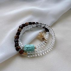 Chinese White Crystal & Chenxiang Wood Beads Bracelet w Turquoise Ganesha Buddha Pendant Crystal Dimension:5.4(mm)0.21(inches)  Wood Dimension:7.7(mm)0.30(inches)  Turquoise Dimension:15.9 x 11.5 x 9.4(mm)0.63 x 0.45 x 0.37(inches)  Check our more items: https://www.etsy.com/shop/QuanRongGallery?ref=seller-platform-mcnav&section_id=17886580&page=2#items Condition: Please look at pictures carefully and judge the condition before bidding.Please do not hesitate to contact me if you have any question with my items or don't understand the condition of the items after reading my listing page. Shipping / Handling Estimate 7-10 business days arrival depending on your location and tracking number will be provided after sending. Please let us know when you received the items by leaving a positive fe Wood Bead Bracelet, Buddha Pendant, White Crystal, Beads Bracelet, Ganesha, Wood Beads, Tracking Number, Beaded Bracelets, Turquoise