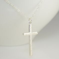 "Hammered cross necklace. Cross necklace. Large cross necklace. Cross long necklace The cross pendant is large and can be worn every day.  ♡ Sterling silver cross pendant is 1.25\" x 11/16\". ♡ Sterling silver necklace chain    - model wears a 22\" necklace ♡ Sterling silver components" Silver Cross Pendant Necklace For Everyday, Simple Sterling Silver Cross Pendant Necklace, White Cross Necklace With Medium-length Chain, Everyday Sterling Silver Crucifix Necklace, Silver Crucifix Necklace For Everyday, Silver Crucifix Cross Necklace For Everyday, Nickel-free Sterling Silver Cross Pendant Necklace, Minimalist Sterling Silver Cross Pendant Necklace, Minimalist Silver Cross Necklace