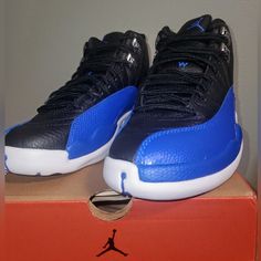 Jordan 12's Brand New In Box Retro Hyper Royal/Black Woman's Size 5.5 Black High-top Basketball Shoes With Padded Tongue, Black Low-top Basketball Shoes With Padded Tongue, Low-top Synthetic Basketball Shoes With Padded Tongue, Black Lace-up Jordan Shoes With Air Cushioning, Synthetic Low-top Basketball Shoes With Padded Tongue, Synthetic Basketball Shoes With Padded Tongue, Black Synthetic Jordan Shoes With Contrast Sole, Jordan 12s, Air Jordan 12