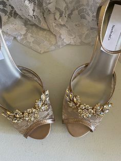 "COLORS: *CHAMPAGNE/GOLD, *Ivory/gold, *Off-white/gold, *White/Silver, *Silver/Silver, Off-white Silver.* the center adornment will be the same as the one on the video only. HEEL: 3 1/2\" inches heel US SIZES: B5, 5.5, 6, 6.5, 7, 7.5, 8, 8.5, 9, 9.5, 10, and 11. FINAL SALE! NO RETURNS, NO EXCHANGES, PLEASE CONTACT FOR ANY QUESTIONS, OR HELP YOURSELF WITH SIZING GUIDE PICTURED ABOVE. SHOES CAN NOT BE RETURNED OR EXCHANGED; I'll make all the efforts to help you have a pleasant shopping experience; Champagne Heels Aesthetic, Gold Wedding Shoes With 4-inch Heel, Elegant Gold Low Heel Shoes, Elegant Gold Embellished Heels, Elegant Embellished Gold Heels, Elegant Gold Wedding Shoes For Evening, Gold Wedding Shoes With 4-inch Heel And Pointed Toe, Gold Wedding Shoes With 4-inch Pointed Heel, Gold Embellished Open Toe Heels