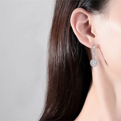 These elegant long drop earrings bring an added touch of elegance and sophistication to any ensemble. This one of a kind, ultra-sparkling, timeless piece is sure to turn heads. They are secured with a push-back post. - Stone Material: Cubic Zirconias.- Stone Shape: Round.- Metal: Copper.- Plating: White Gold Plated.- Size: Aprox. 2.9 cm Long.- Closure: Push Back Post.Ships in a Balara Gift Pouch.Available in Silver SKU# E2085 Teen Earrings, Rose Gold Moissanite Ring, Dainty Choker Necklace, Boutique Wholesale, Silver Diamond Necklace, Moissanite Diamond Rings, Jewelry Boutique, Tassel Drop Earrings, Long Drop Earrings