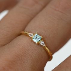 Made of Sterling Silver 14K Gold or Rhodium plated Nickel-free & Hypoallergenic Highest grade CZ for an authentic look Available in sizes 4-10 Gold Minimalist Ring, March Birthstone Ring, Dainty Gold Rings, Zierlicher Ring, Aquamarine Engagement Ring, Aquamarine Ring, March Birthstone, Birthstone Gifts, Minimalist Ring