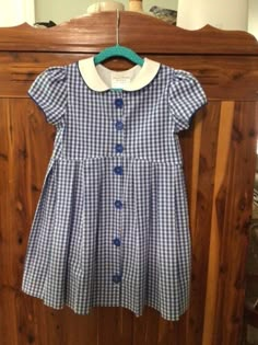 Great Back to School Checked dress with white collar. Bodice is lined. Skirt is pleated all around. Very vintage looking dress. Collar is piped with blue. Buttons up front with bright blue buttons. Cap sleeves are lined with gathers at shoulders. Skirt has 3 in hem. Bodice is curved slightly in front making for additional vintage look. Size 6 - Ready to Ship Vintage Collar Dress, Collared Dress Outfit, Moodboard Manifestation, Babydoll Dress Outfit, Dress With White Collar, Checked Dress, Dress Collar, People Clothes, Crazy Outfits