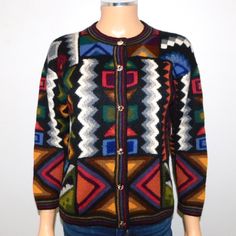 Luxurious 100% Baby Alpaca Knitted By Hand Multi-Color Geo Pattern Cardigan. No Size Tag, Measures To Fit A Women's Size Small. Excellent Condition! Features Incredible Intricate Pattern, Painted Buttons, Made In Peru, Very Soft, Very Beautiful. You Will Love It! Length - 21" Bust - 19" Waist - 18" Shoulder Seam - 19" Sleeve - 17" Measurements Taken With The Garment Laying Flat, And Are Approximate. Please Check Before Ordering To Ensure The Perfect Fit Black Jacquard Knit Cardigan, Multicolor Wool Long Sleeve Cardigan, Black Casual Cardigan With Fair Isle Pattern, Black Alpaca Sweater For Fall, Casual Black Cardigan With Fair Isle Pattern, Fall Black Alpaca Sweater, Black Fair Isle Pattern Cardigan For Fall, Black Fair Isle Cardigan For Fall, Multicolor Wool Cardigan For Winter