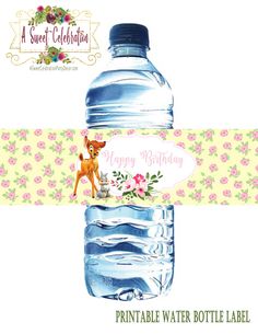 a water bottle label with a deer on it and flowers around the edges that says happy birthday