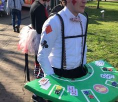 a man dressed up as a card table