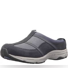 The Easy Spirit Women's Argyle Mule In Blue 420 Is A Stylish And Comfortable Slip-On Shoe Designed For Women. This Mule Features A Removable Insole, Allowing You To Customize The Fit And Comfort Level To Your Liking. The Mule Is Made By Easy Spirit, A Trusted Brand Known For Their Quality Footwear. It Is Made With A Combination Of 80% Suede And 20% Mesh Fabric, Giving It A Unique And Fashionable Look. The Rubber Sole Provides Excellent Traction And Durability, Making It Suitable For Everyday Wea Slip-on Sneakers With Ortholite Insole For Outdoor Activities, Slip-on Synthetic Sneakers For Outdoor Activities, Cushioned Synthetic Sneakers, Slip-on Sneakers With Cushioned Footbed For Outdoor Activities, Sporty Round Toe Slip-ons With Removable Insole, Sporty Slip-on Walking Shoes With Round Toe, Gray Slip-on Sneakers With Closed Toe, Sporty Synthetic Walking Shoes With Closed Toe, Gray Closed Toe Synthetic Sneakers