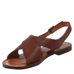 Roman style women's sandal with double crossed band



 Smooth brown vegetable tanned leather

 Strap closure



 Leather sole



 Made in Italy




 Composition:
 Upper: 100% Leather
 Lining: 100% Leather
 Bottom: 100% Leather
 Insole: 100% Leather

 Narrow fit, it is recommended to take one size larger than usual. Brown Leather Strap Closed Toe Sandals, Brown Closed Toe Slingback Sandals With Leather Lining, Brown Leather-lined Closed Toe Slingback Sandals, Brown Leather Cross Strap Slingback Sandals, Brown Leather Sole Open Toe Footbed Sandals, Leather Cross Strap Slingback Sandals With Heel Loop, Brown Slingback Sandals With Rubber Sole And Open Heel, Brown Open Heel Slingback Sandals With Rubber Sole, Leather Cross Strap Sandals With Leather Sole