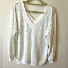 Nwot White Sweater. Wide V-Neck In Front And Back Can Be Worn Off One Or Both Shoulders. See Through Knit Material Can Be Worn With Bralette Or Tank Top. Never Worn, Size Large. White Stretch V-neck Sweater For Spring, White Waffle Knit Tops For Spring, White Waffle Knit Top For Fall, Chic White V-neck Sweater For Spring, Spring White Waffle Knit Tops, White Winter Tops For Brunch, White Winter Top For Brunch, Casual White Sweater For Brunch, Off Shoulder Sweater