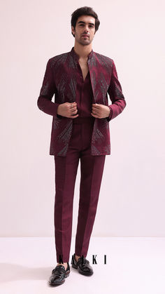 Experience a blend of contemporary style and timeless traditions with our maroon Jodhpuri ensemble. Featuring a hand embellished open bandhgala with glistening cutdana accents. Fabricated from luxurious linen satin.
this expertly crafted outfit is complemented with a chinese collar shirt and co-ordinating straight pants. Ethnic Fashion Men, Boys Shirts Style, Chinese Collar Shirt, Jodhpuri Suit, Party Outfit Men, Satin Hands, Chinese Collar, Dress Suits For Men