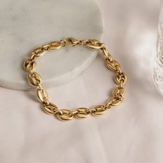 Sku: NSB1733STGC Details: Spectular minimalist gold coffee bean chain bracelet that gold plated over stainless steel material. Simple and elegant, this high-quality chain is the perfect thickness to pair with any outfit. Stainless Steel 316L features: With its resistance to rust and oxidation, this corrosion-resistant alloy is ideal for long-lasting jewelry designs. This metal is the best suggestion for those living in high-humidity locations, as the metal will keep from rusting much longer than Chain Set Gold, Set Gold Jewelry, Gold Jewelry Gift, Gold Coffee, Gold And Silver Bracelets, Gold Statement Ring, Chunky Jewelry, Stacked Bangles, Gold Bracelet Chain