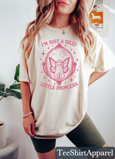 I'm Just A Silly Little Princess Shirt, Meme Shirt, Cat Lover Gift, Funny Cat Shirt, Cat T-shirt, Funny Sayings Shirt, Meme Graphic Tees, 90s Graphic Shirt Sizing and Color Information:  Our shirts are made to order specially for you. For this reason, we don't accept returns or exchanges. To ensure the perfect fit, please refer to our color and size charts before placing your order. If you have any questions, don't hesitate to send us a message to clarify sizing or colors. HOW TO ORDER MULTIPLES: 1. Select your size and color in the drop down menus & add to cart! 2. Then simply go back and repeat for each shirt. If you want to add or change anything on the existing design that we show in the display picture, please contact with us. Product Information: (T-shirts and Long Sleeve T-shirts) S Funny Princess, Princess Shirt, Cat Lover Gift, Cat T Shirt, Cat Shirt, Funny Sayings, Cat Shirts, T Shirt Funny, Funny Cat