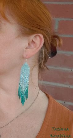 These handmade earrings are made of high-quality Czech beads and strong synthetic thread. They are elegant, fashionable, and highly versatile, suitable for everyday wear. Color: turquoise, emerald, teal . 100% hand made with love! Measurements: Length-about 11.5cm (4.33 inch) Width -about 2 cm (0.79 inch) Materials: Sterling silver components Czech glass beads Nylon Thread Chandelier Boho, Teal Earrings, Earrings Chandelier, Abstract Floral Print, Color Turquoise, Earrings Long, Seed Bead Earrings, Czech Beads, Fringe Earrings