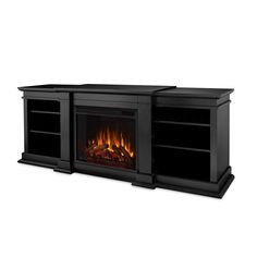 an entertainment center with a fire place and two shelves on each side, in black