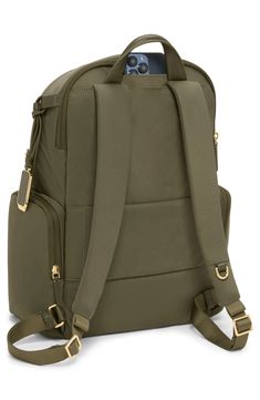 This travel-ready backpack features a handy Add-A-Bag sleeve for sliding onto suitcases along with a durable nylon design and well-organized interior. Top carry handle; adjustable backpack straps Two-way top-zip closure Exterior front zip pockets; side zip pocket; back smartphone pocket; back luggage sleeve Interior zip pockets; padded laptop pocket Nylon/leather Imported This bag includes Tumi Tracer®, an exclusive, complimentary program that helps reunite lost or stolen bags with their rightfu Versatile Backpack For Trips With Zipper Closure, Nylon Travel Bag With Adjustable Strap For Commuting, On-the-go Nylon Luggage With Adjustable Strap, Versatile Nylon Luggage With Functional Pockets, Luxury Nylon Luggage For Everyday Use, Nylon Backpack With Adjustable Strap For Overnight Trips, Nylon Backpack Luggage With Zipper Closure, Versatile Backpack With Luggage Sleeve For Trips, Versatile Backpack For Trips