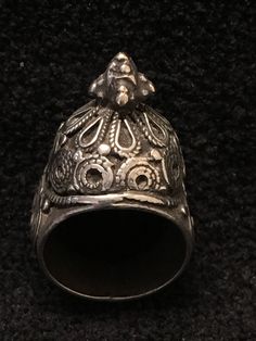 Ring ~ Vintage Tribal Dome Ring, Yeman Size 7 1/2 Early 1900's A Warrior Princess Ring This is an impressive and heavy Bedouin tower ring. It has decorations on all sides of the tower, a pyramid of silver drops that spill over to the sides of the single shank band. The ring face tests positive for silver but the shank has little precious metal. It is in good vintage condition and looks lovely on. Yes ~ along with basic simplicity ~ It's all about you You deserve to know about my fabulous Treasur Ethnic Rings, Statement Piece Jewelry, Chest Opening, The Ring Face, Princess Ring, Beaded Handbag, Warrior Princess, The Tower, Domed Ring