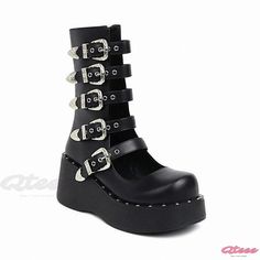 Qteee - Contemporary Round Toe Martin Boots with Punk-inspired Platform Design Punk Style Platform Boots With Round Toe For Concerts, Punk Style Platform Boots With Spikes For Fall, Punk Style Platform Boots For Concerts In Fall, Punk Style Boots With Rivets For Cosplay, Punk Platform Boots With Grommets, Punk Platform Boots With Grommets For Alternative Fashion, Trendy Rivets Boots For Alternative Fashion, Trendy Rivets Boots For Concert, Punk Style Closed Toe Boots For Streetwear