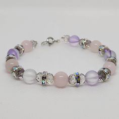 Shiny bracelet made with natural rose quartz and iridescent beads. Shoujo Life, Rose Quartz Bracelet Beads, Shiny Bracelets, Rose Quartz Beads, Quartz Rose, Bracelet Making, Beaded Bracelet, Rose Quartz, Jewelry Bracelets