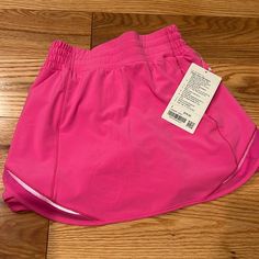 Lululemon Hotty Hot Skirt New With Tags (Pink) Pink Sports Skort With Built-in Shorts, Pink Casual Workout Skort, Sporty Pink Tennis Skirt, Casual Pink Workout Skort, Pink Athleisure Tennis Skirt, Pink Athleisure Tennis Skirt For Sports, Sporty Pink Skort For Gym, Casual Pink Tennis Skirt For Sports, Casual Pink Tennis Skirt For Workout